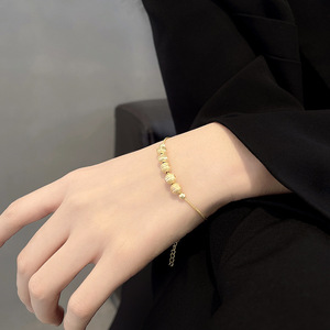 สร้อยข้อมือสแตนเลส SL321 ดีไซน์ทันสมัย ประดับลูกปัดทองเม็ดเล็ก รูปทรงกลม สำหรับสาวๆ เหมาะสำหรับวันครบรอบ ขายส่งเครื่องประดับ - Product Image 4