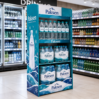 Présentoir de sol en carton graphique pour bouteilles d'eau, idéal pour la promotion de l'eau minérale pétillante