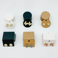Supports à boucles d'oreilles en carton uni en gros, disponibles en noir, blanc et marron
