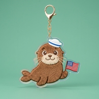 Porte-clés personnalisé en plastique Lion de mer, Breloque de sac en fourrure chenille et acrylique avec drapeau américain, Souvenir personnalisé