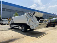 Camion compacteur de déchets I-suzu ELF 4X2 6m3, camion d'élimination des déchets, camion de compression des ordures