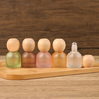 Flacon à bille en verre coloré de 10 ml avec bouchon en bois, flacon portable pour huiles essentielles, contenant d'échantillons cosmétiques