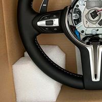 Volant de voiture en cuir noir en stock pour BMW F01 F02 F07 F30 F31 F10 F12 F15 F16 F34 F35 F36 F20 F22 F25 F32 F90 M3 M4 M5