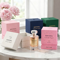 Boîte cadeau rigide écologique pour huiles essentielles et parfums avec couvercle et base en carton blanc rose à finition mate, boîte pour huiles essentielles