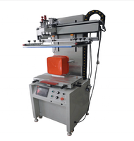 Grande machine de sérigraphie semi-automatique pour l'impression d'étiquettes sur des seaux pour animaux de compagnie
