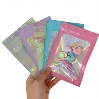 Sachet d'emballage personnalisé mini transparent holographique rose refermable anti-odeur pour aliments, boucles d'oreilles et lunettes