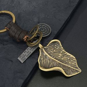 Llavero de metal retro para bicicleta con colgante de aleación de bronce con cara sonriente y estrella hexagonal, de cuero trenzado, regalo creativo, venta al por mayor - Product Image 4