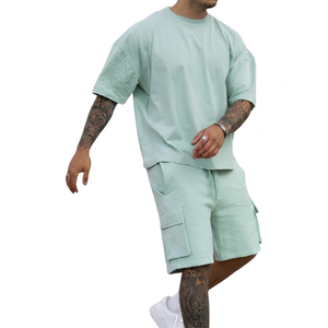 Conjunto Deportivo Casual Verde Menta para Hombre, Camiseta de Manga Corta, Pantalones Cortos Cargo, Transpirable, Color Sólido, Cuello Redondo, Corte Holgado, Ropa de Verano - Product Image 1