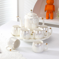 Service à eau en céramique blanc nacré de luxe léger, ensemble de tasses à café et pot, cadeau haut de gamme, service à thé domestique