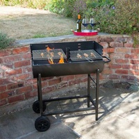Barbecue à charbon de bois professionnel pour fête dans l'arrière-cour