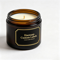 Étiquettes de bougies cadeaux haut de gamme Haoxuan OEM, autocollants adhésifs imperméables en PET noir avec impression dorée pour emballages de luxe