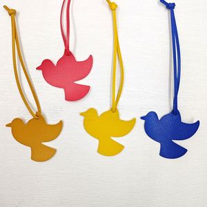 Hot-selling Peace Dove <b>Charm</b> Pendants Women's Luggage Tags PU Leather Keychain Pendant Accessories Hanging Ornaments - Product Image 3