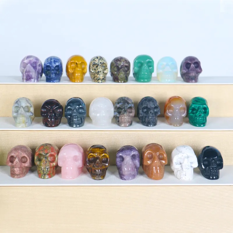 Gemme de pierre naturelle de haute qualité de 2 pouces, une variété de couleurs crânes de cristal sculptant pour la décoration de la maison et fengshui