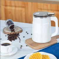 Moulin à café électrique mini multifonctionnel automatique pour noix, épices et grains, idéal pour la maison – Nouveauté très demandée