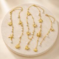 Collier Y en or PVD 18K avec perles et breloques animaux marins (étoile de mer, dauphin, tortue, pieuvre) – Colliers délicats en gros pour OEM