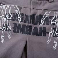 Jean en coton 100% pour homme, taille mi-haute, imprimé motif main et lettres, délavage foncé, style urbain hip-hop, micro-évasé, collection printemps