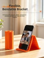 Support de téléphone pliable multi-angles en silicone antidérapant, support de bureau enroulable universel pour smartphone et tablette, pour une utilisation au bureau et en voyage