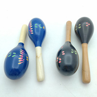 Ensemble de 6 instruments à main en bois pour la petite enfance : martellet à galets et balles, pour la maternelle et l'éducation préscolaire, laqué bleu et noir gravé