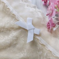 Vente en gros Petit nœud DIY Personnalisé Mini ruban de satin nœud Élastique en nylon Décoratif en couleurs unies Boîte pré-attachée Décoration Ruban nœuds