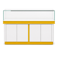 Vitrine d'exposition de style chinois en panneaux stratifiés blancs avec bordure dorée, éclairage LED et îlot en verre pour boutique de détail et exposition de parfums