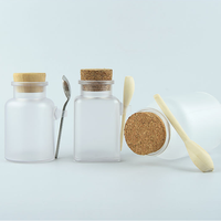 Bouteille de sel de bain ronde carrée en plastique noir blanc transparent givré de 100g 200g 300g 500g avec bouchon et cuillère en bois pelle en acier