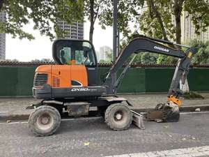Excavatrice d'occasion 5 tonnes Doosan DX60W Excavatrice à roues Excavatrice d'occasion Doosan DX60W Mini taille Moteur YANMAR 4TNV94L à vendre - Product Image 2
