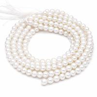 Chaîne de perles d'eau douce naturelles 9-11 mm Perles blanches Edison baroques plates 40 cm Vente en gros pour la fabrication de bijoux