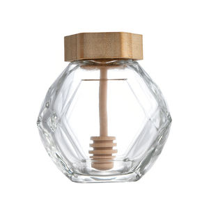 <span class=keywords><strong>Pot</strong></span> en verre <span class=keywords><strong>de</strong></span> <span class=keywords><strong>miel</strong></span> <span class=keywords><strong>de</strong></span> luxe 250g/500g 180ml/360ml bocaux <span class=keywords><strong>de</strong></span> stockage des aliments en verre <span class=keywords><strong>de</strong></span> silex hexagonal avec bouchon en plastique en métal pour confiture <span class=keywords><strong>de</strong></span> bonbons - Product Image 1