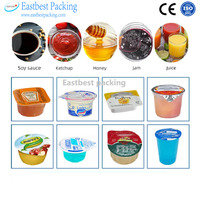 Machine de remplissage et de scellage automatique multi-têtes haute vitesse en ligne pour pots de sauce 1oz, 2oz, 5oz, idéale pour l'emballage de yaourts, miels et confitures en restauration