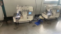 Nouvelle machine à coudre surjeteuse industrielle à lit plat haute vitesse avec coupe-fil automatique et moteur pour l'industrie du vêtement