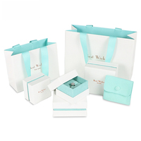 Boîte à bijoux en carton blanc avec Logo personnalisé, petite boîte cadeau pour pendentif, bague, emballage de bijoux en papier, boîte et pochette