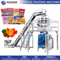 Machine d'emballage verticale automatique de remplissage, scellage et découpe pour aliments, produits d'épicerie, snacks, bonbons, confiseries, machine d'emballage sous vide