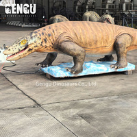 Écran animatronique intérieur personnalisable en forme de lézard géant avec tête, bouche, yeux, jambes pour centre commercial