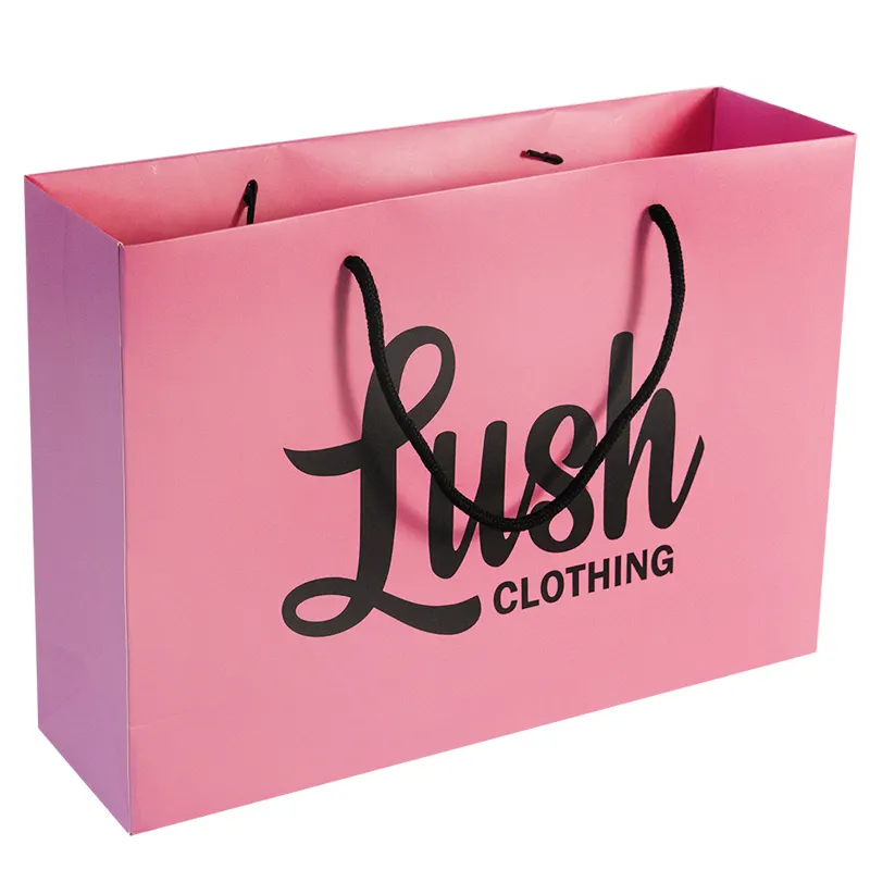 Bolsa de papel de lujo con logotipo personalizado al por mayor, bolsa de regalo rosa, bolsas de papel, bolsas de cartón con asas para ropa