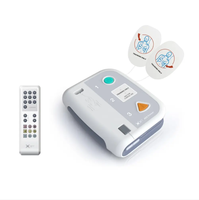 AMAIN CE Simulateur de défibrillateur externe automatique Entraîneur AED en espagnol et en anglais Entraîneur de défibrillateur AED