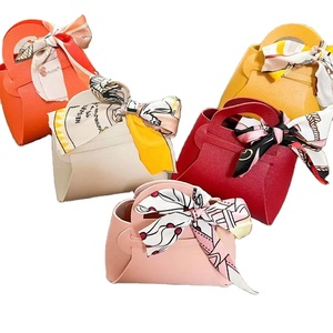 Wholesale Mini <b>Clutch</b> <b>Bags</b> Leather Gift <b>Bags</b> for Weddings Hand-Held Candy <b>Bag</b> with Ribbon Elegant and New Design for Guests - Product Image 1
