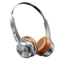 Casque audio sans fil Bluetooth supra-auriculaire compact en cuir souple avec poignée métallique brillante, réduction active du bruit, idéal pour les voyages et l'aviation