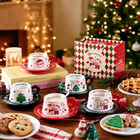 Ensemble tasse et soucoupe en céramique Anji Newell pour Noël avec design de dessin animé, conservation de la chaleur, couleur et logo personnalisés, emballage en boîte cadeau