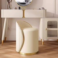 Tabouret de vanité de luxe à rayures verticales et dossier incurvé avec base en métal doré, tabouret de maquillage rotatif rembourré en cuir microfibre