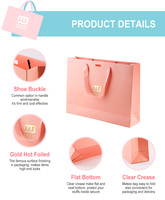 Sac en papier d'art exclusif rouge et bleu personnalisé avec différentes poignées pour emballage cadeau de bijoux, vêtements de mariage et articles de luxe