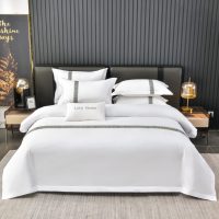 Ensemble de literie de luxe avec sangles brodées, 4 pièces, housse de couette blanche pure pour hôtel 5 étoiles, vente en gros
