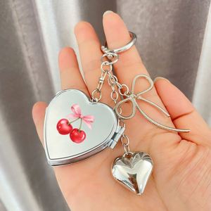 Wholesale Double-sided Stainless Steel Pocket <b>Makeup</b> Mirror Keychain <b>Compact</b> Pocket Love Mirror Keychain - Product Image 1