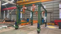 Grue portique monopoutre durable sans rail, à 4 roues motrices, pneus pleins, moteur diesel 50 tonnes pour déchargement de marchandises en entrepôt