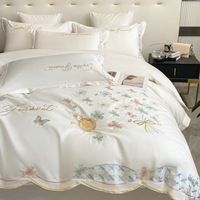 Ensemble de literie en soie véritable de style princesse d'usine ensemble de quatre pièces de drap de lit d'été brodé en soie glacée double face pour un usage domestique