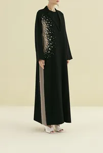 2024 U.Chic nouveau Design moyen-orient classique noir femmes Abaya dubaï cousu à la main perles coquille Abaya femmes robe musulmane