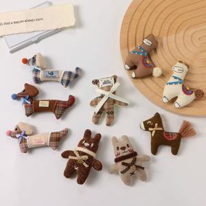 새로운 한국 스타일 어린이용 유니섹스 포니 <span class=keywords><strong>DIY</strong></span> 패브릭 포장 폴리에스터 브로치 - Product Image 3