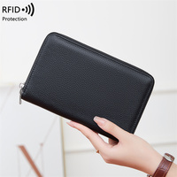 Portefeuille de voyage grande capacité en cuir pleine fleur de haute qualité avec blocage RFID pour femme