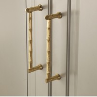 Poignées de porte et poignées de meuble en laiton doré de type flèche pour cuisine, chambre et commode - Quincaillerie de mobilier design Mid-Century en gros