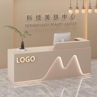 Bureau de réception moderne en forme de L en MDF pour hôtels, salons de beauté, bureaux avec éclairage LED