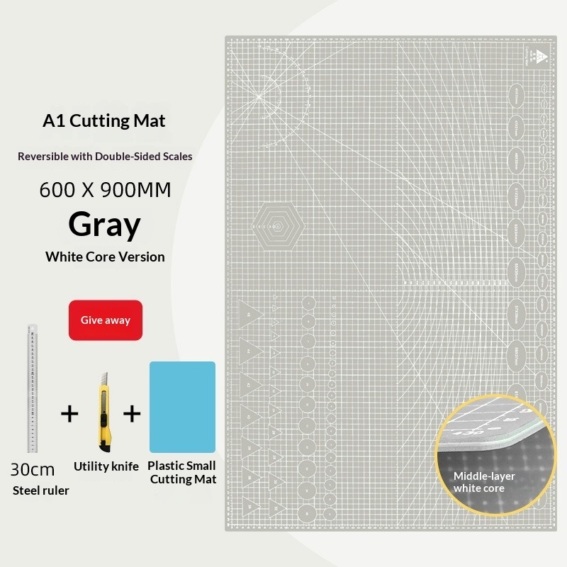 Tapis de découpe 60x90 cm gris avec noyau blanc.